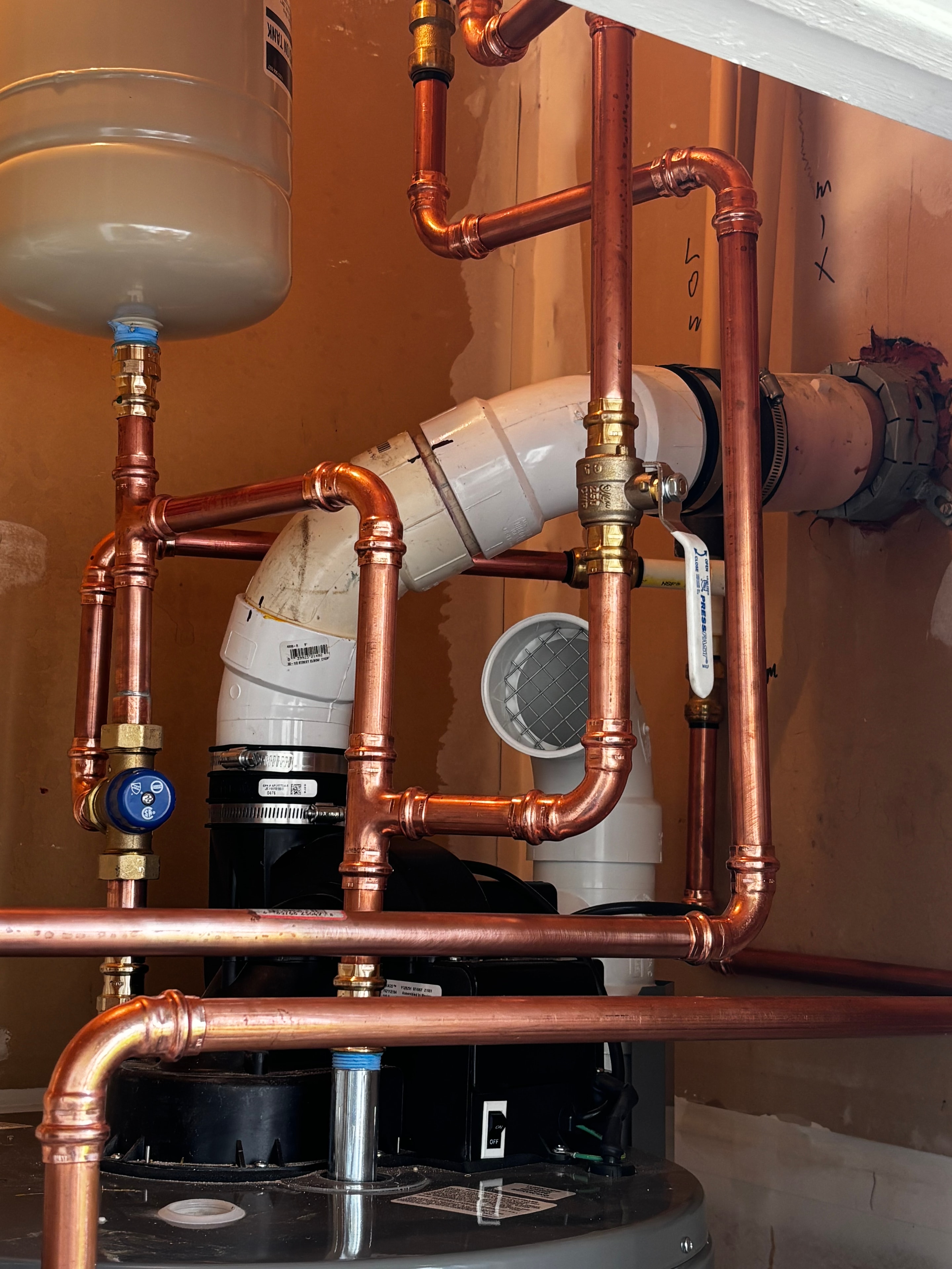 Custom copper water heater plumbing system installed by Revell Plumbing