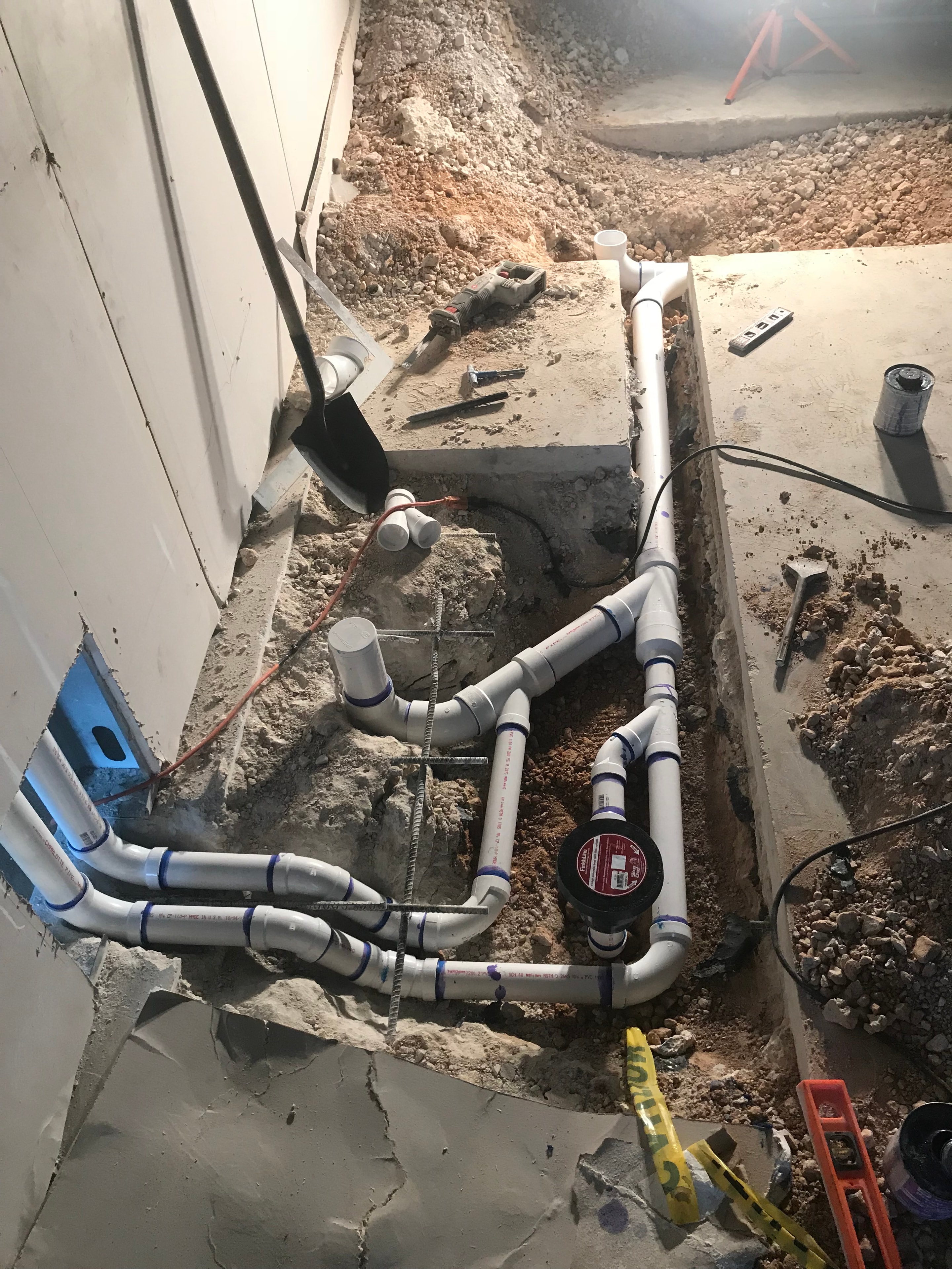 Underground PVC drain pipe installation