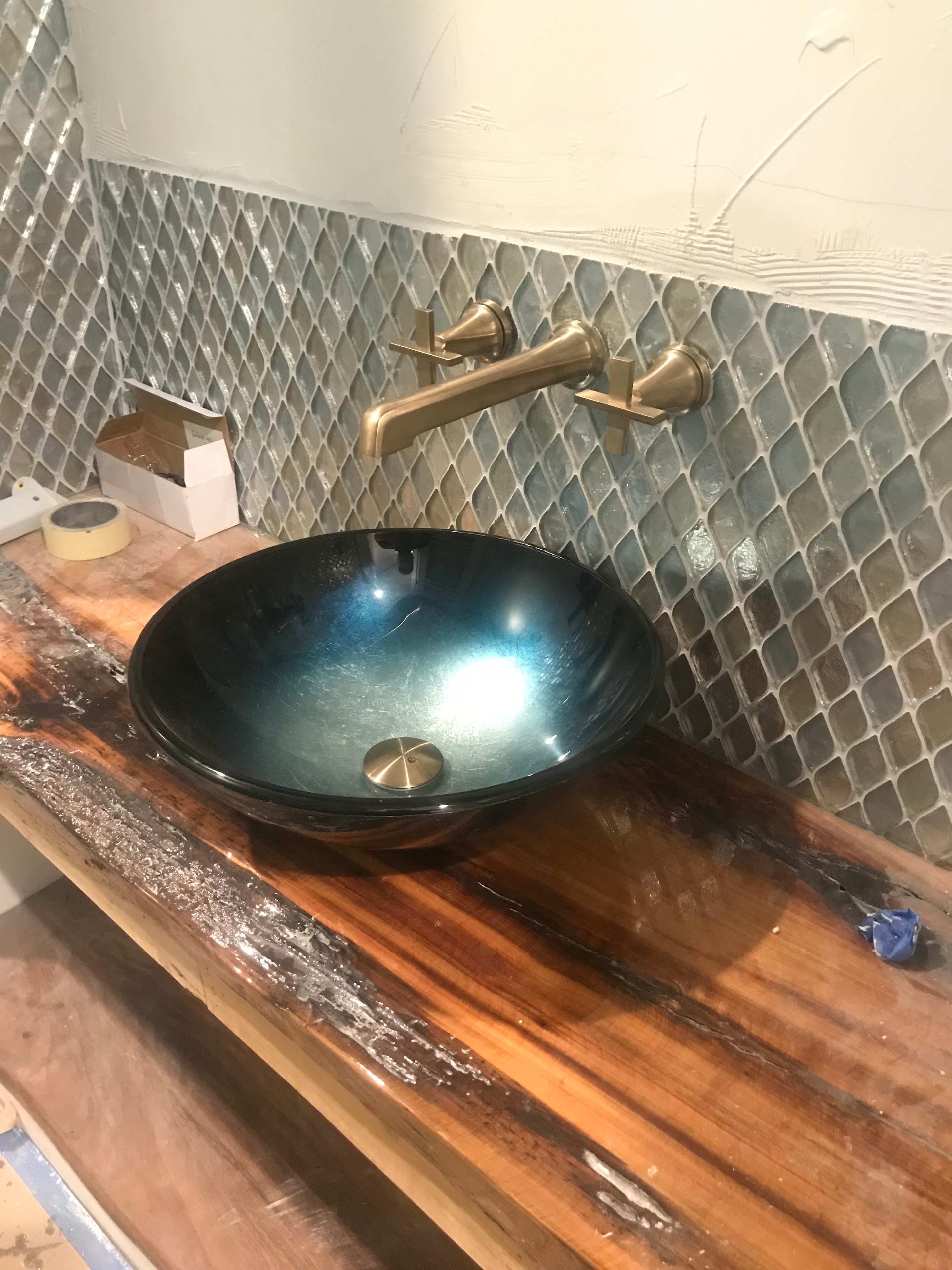 Custom vessel sink and brass fixture installation