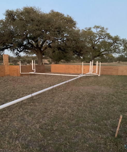 Outdoor PVC water line layout on rural property